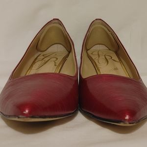 J. Renee red, size 7m with a 2 1/2" heel.